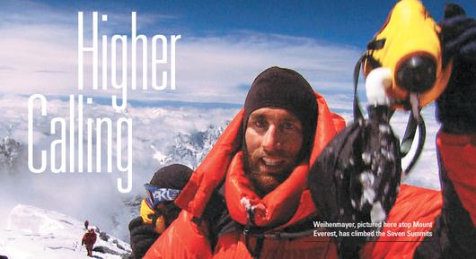 Weihenmayer, pictured here atop Mount Everest, has climed the Seven Summits